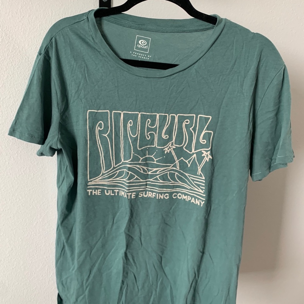 teal and blue rip curl tee
